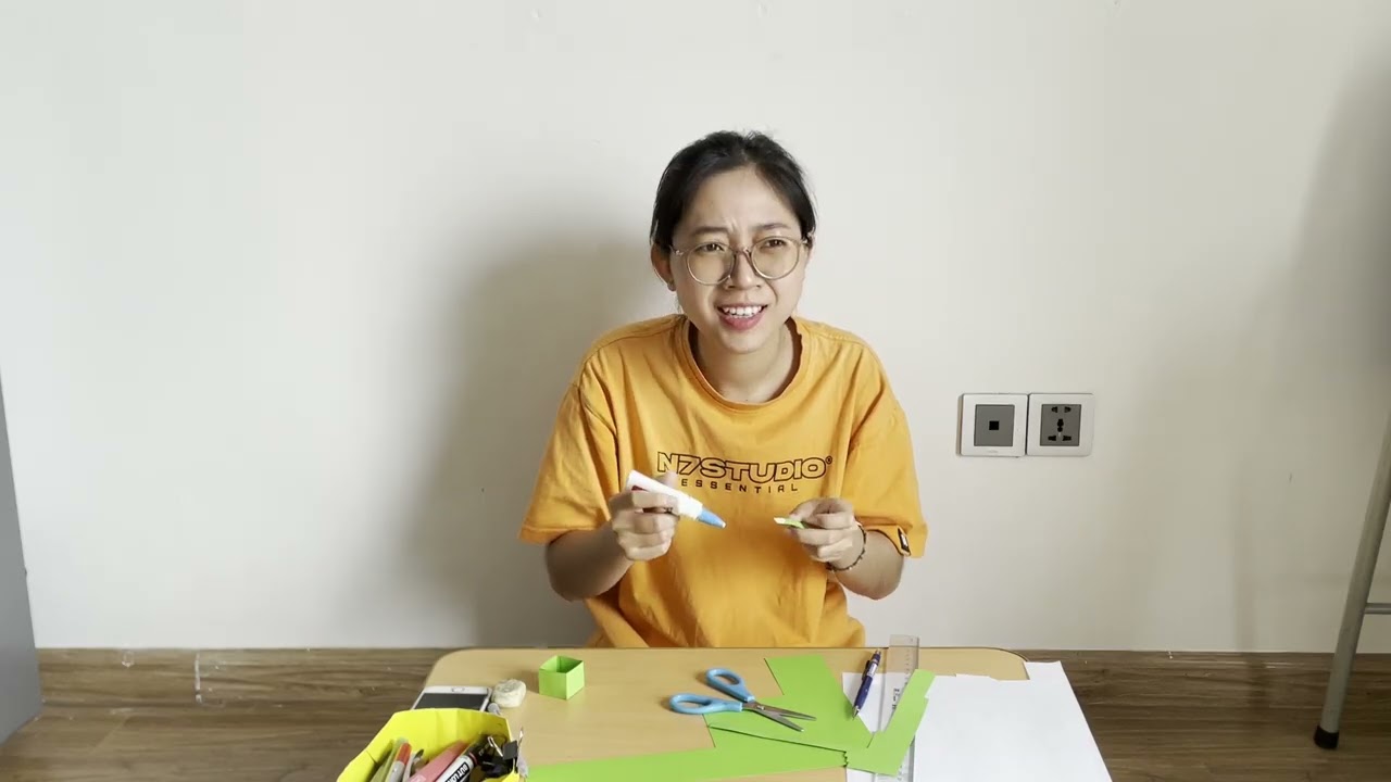 Instructions for making a paper bag with a cat shape