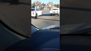 1991 Cadillac Sedan DeVille canary yellow and white