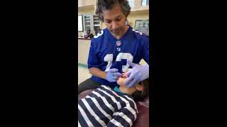Dr. Murthy Adds wire to Braces
