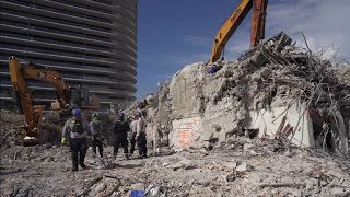 Confirmed deaths in condo collapse now at 90