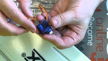 Gluing a servo on EPO EPP RC model with hot glue gun