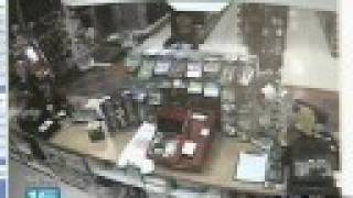 Gas Station Robbery Caught on Surveillance Video