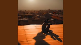 sitting on a rooftop