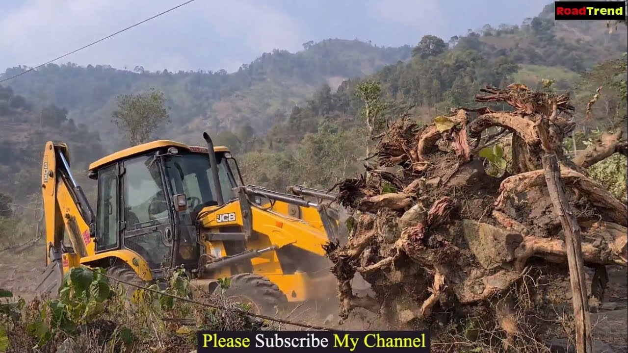 Jcb pushing big tree-Jcb making drain in hill- Amazing video