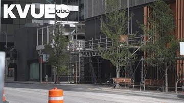 Scaffolding added to Downtown Austin sidewalks where glass panels have fallen
