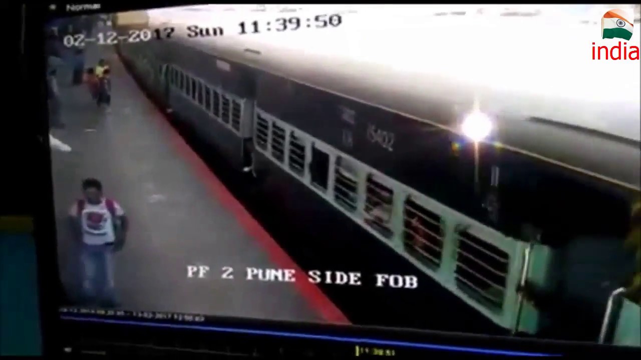 RPF OFFICER SAVES GIRL FROM FALLING OFF MOVING TRAIN - YouTube