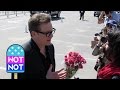 EXCLUSIVE: Colin Firth Gets a Kiss & Flowers from Fan at Spirit Awards