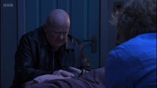 Eastenders Phil puts the one last stone in Nigel’s hand as grant sits on Phil’s couch alone scene