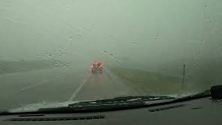 ( A rain shower on the way to Seattle, Montana.)
