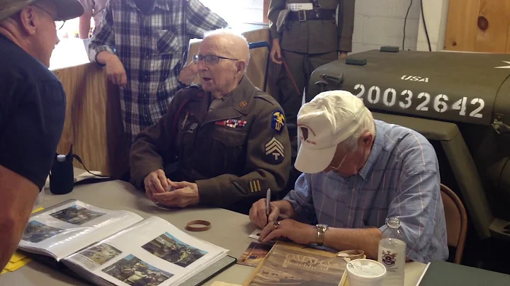 Pap (Roy Kilpatrick) signing a WW2 penny at the Bl...
