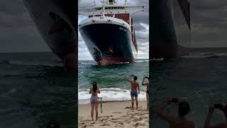 A cargo ship moored to the beach. #ship