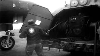 AO load ammunition in nose guns of US Navy Lockheed P2V Neptune and clean out gun...HD Stock Footage