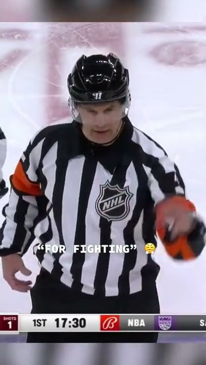 Wes McCauley tripping on the ice as a referee