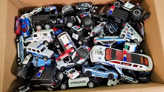 Box Full Of Police Car Diecast Cars Large collection of police diecast cars from different countries screenshot 5