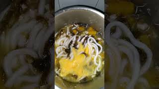 Dropping Egg To Noodles