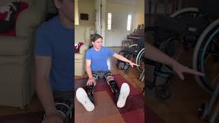 Paraplegic putting on KAFO leg braces