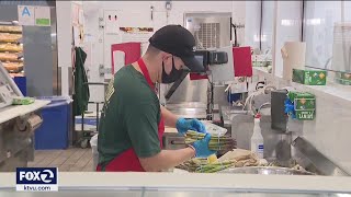 California drops workplace mask rule for vaccinated workers