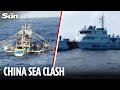 Moment Chinese ships HARASS Filipino fisherman and stalk boat near South China Sea