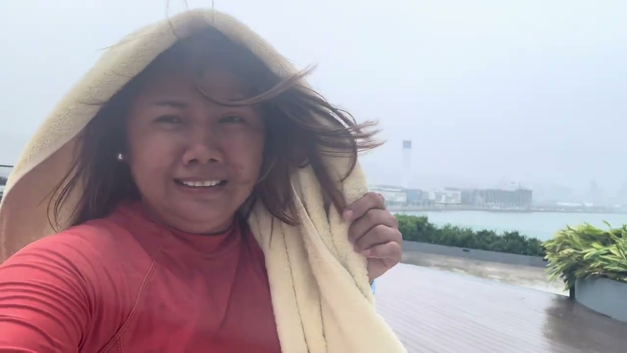 Went to to swim despite of a bad weather in Cebu today .