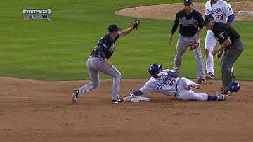 Puig hustles to second after wild throw