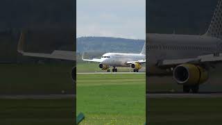 Zurich Airport Vueling Airplane Airbus A320-232 Ec-Odm Landing On A Spring Day.