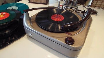 Voice of Music record changer playing a 78 RPM record.