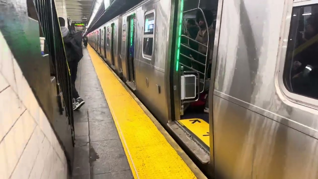 R211T G train with clear speakers at Bedford-Nostrand Avenues