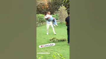 محمد رمضان يحمل دينا الشربيني 