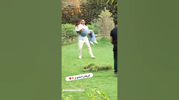 محمد رمضان يحمل دينا الشربيني 