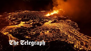 video: Pictured: Spectators flock to dramatic volcanic eruption in Iceland