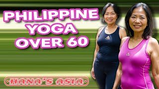 Natural Older Philippine Women Over 60 Practicing Yoga in the Backyard
