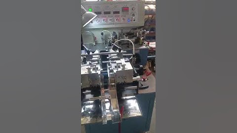 YS-3000 automatic fabric label cutting and folding machine centre fold test on printed care label