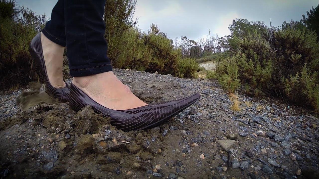 Pointed Toe Stiletto Heels Sinking In Mud & Dirt Heel Digging