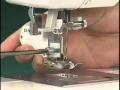 上送り押え