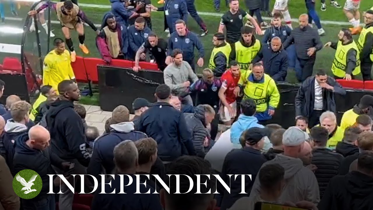 Moment Angelo Ogbonna attempts to stop AZ Alkmaar fans invading West Ham stand