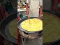 This Chinese street food is called 鸡蛋饼 (egg pancake) – crispy outside...