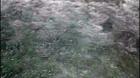 Turbulent two-phase flow with a free surface