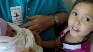 3 year old meets baby sister for the first time