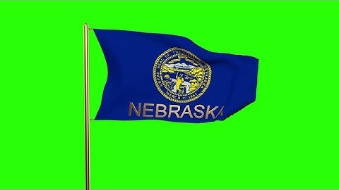 Nebraska Flag With Title Waving In The Wind. Looping Sun Rises Style. Animation Stock Animation