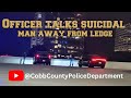 Officer talks suicidal man away from ledge