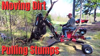 Using my Red Rock/Trencherman mini Towable backhoe from Princess Auto to dig and move stumps