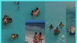 3 Hombres En La Isla De Aruba Que Hacen Juntos?