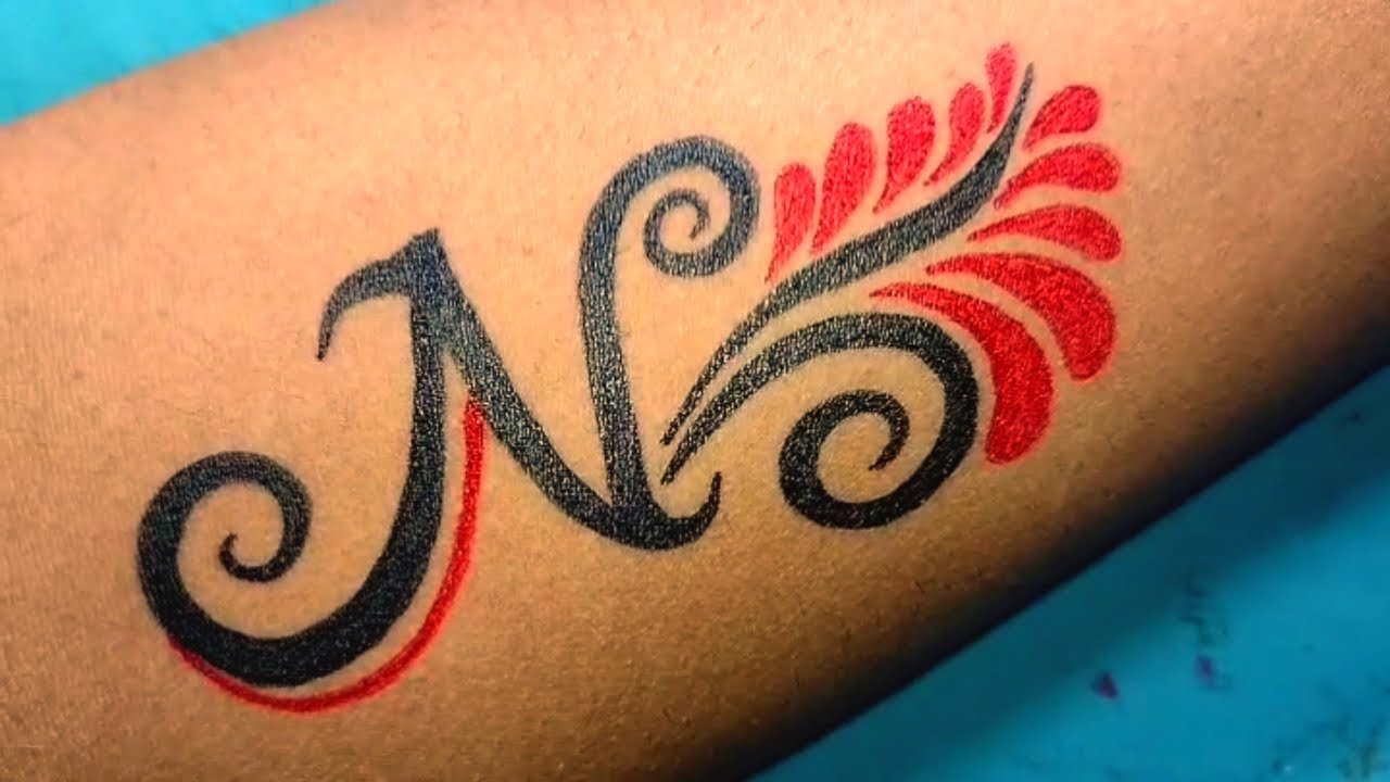 How to make beautiful N letter tattoo at home with pen || Beautiful N❤️ letter DIY temporary tattoo