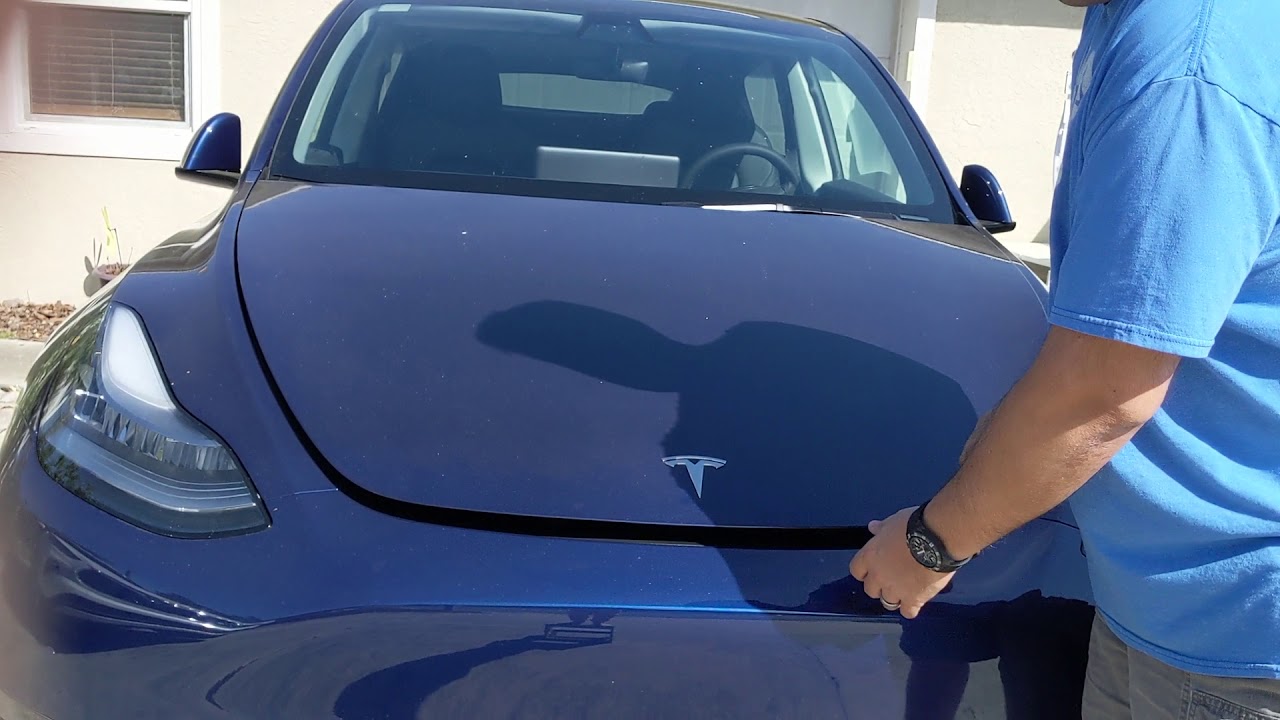The proper way to close the front trunk frunk on a Tesla - YouTube