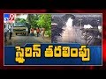 Vizag Collector inspects loading of styrene stock into container at port