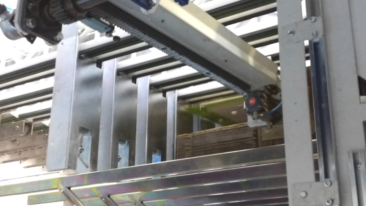 Top vacuum stripper-stacker 1