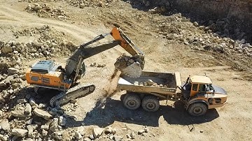 *Quarry flight* Liebherr R970 SME loading Volvo A40F ADT
