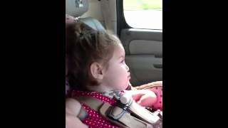 Bella singing in the car