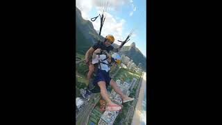 Woman vomiting while skydiving