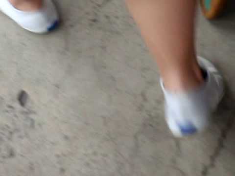 Candid Keds....  white Champs out shopping